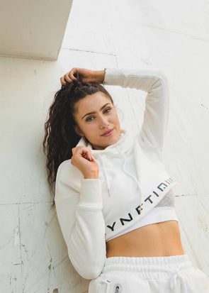 Women's streetwear nz, white crop hoodie, black logo front, hi-low hem, white drawstring